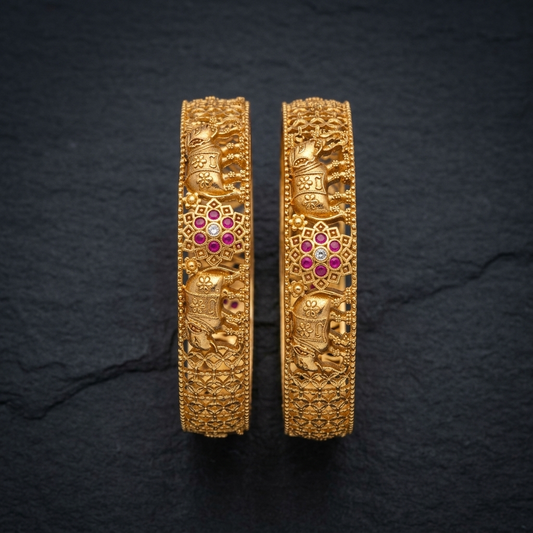 The Royal Gajraj Bangle Set ÔøΩ Set of 2 Matte Gold Temple Kadas with Ruby Floral Accents