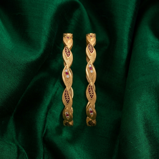 The Aura Leaf Wave Bangles (Set of 2) ÔøΩ Matte Gold with Ruby Accentuation