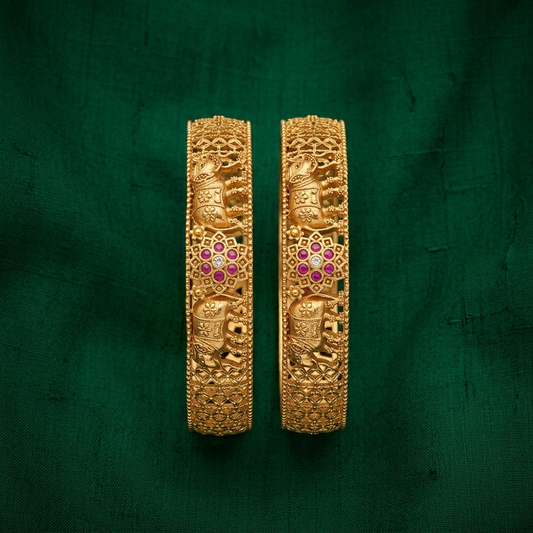 The Royal Gajraj Bangle Set ÔøΩ Set of 2 Matte Gold Temple Kadas with Ruby Floral Accents