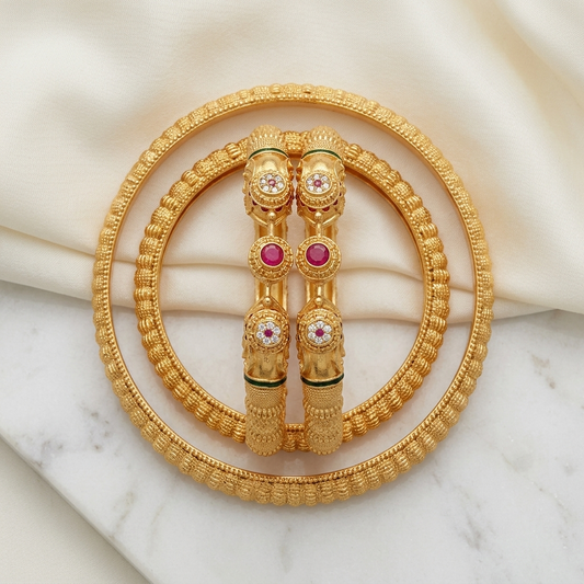 The Majestic Gaja Kada Set ÔøΩ Intricate Gold-Tone Elephant Motif Bangles (Set of 2)