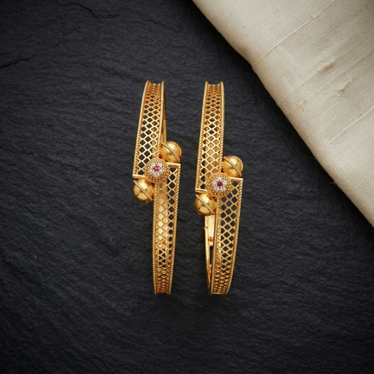 The Aura Filigree Bangle Set (Set of 2) ÔøΩ Handcrafted Gold Kada with Ruby Accents