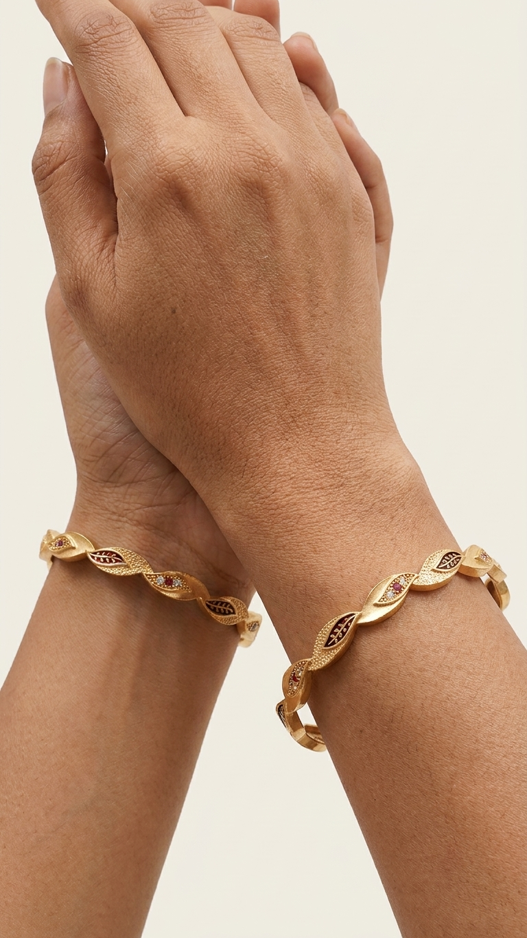 The Aura Leaf Wave Bangles (Set of 2) ÔøΩ Matte Gold with Ruby Accentuation