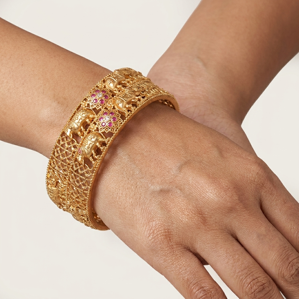 The Royal Gajraj Bangle Set ÔøΩ Set of 2 Matte Gold Temple Kadas with Ruby Floral Accents